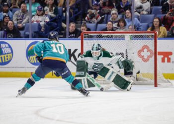 Aerin Frankel of the Boston Fleet watches New York Sirens forward Sarah Fillier approach in the shootout