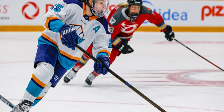 Alex Carpenter carries the puck for the New York Sirens