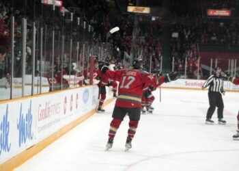 Gabbie Hughes celebrates her overtime winner