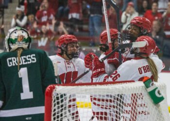 Laila Edwards and Casey O'Brien celebrate with Wisconsin