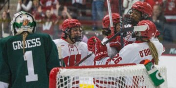 Laila Edwards and Casey O'Brien celebrate with Wisconsin