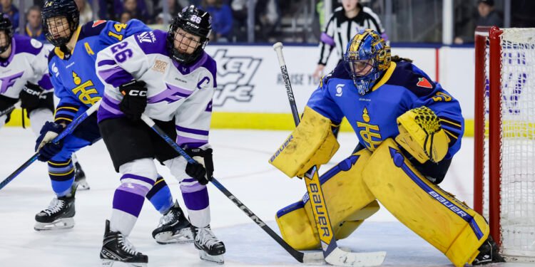 Kendall Coyne Schofield sets up out front of Kristen Campbell in Sunday's game between the Minnesota Frost and Toronto Sceptres - Photo @ PWHL