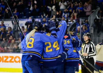 Natalie Spooner and her teammates celebrate