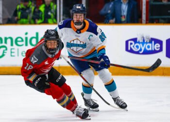 Mannon McMahon of Ottawa and New York's Micah Zandee-Hart watch the play - Photo @ PWHL