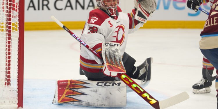Emerance Maschmeyer turns aside a shot for the PWHL's Ottawa Charge - Photo @ Ellen Bond