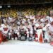 The Wisconsin Badgers women's hockey team celebrates their 2025 WCHA title. They enter the 2025 NCAA women's hockey national championships as the top seed - Photo @ Wisconsin Athletics