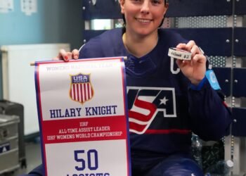 Hilary Knight celebrates her record setting 50th assist - Photo @ IIHF / X
