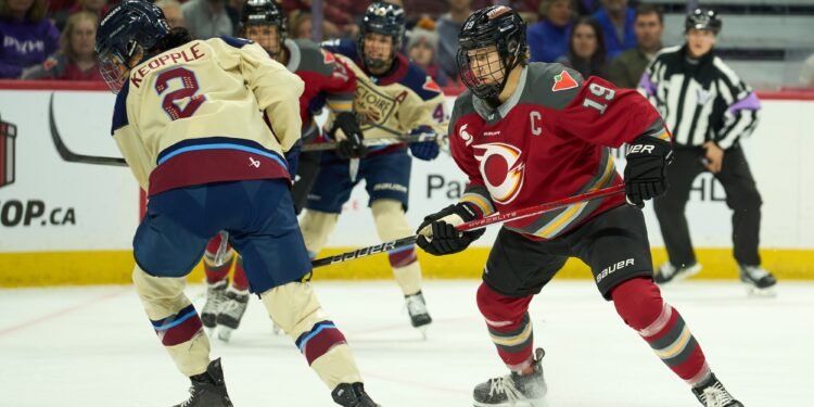 Brianne Jenner and Mariah Keopple watch a puck in PWHL action - Photo @ Ellen Bond